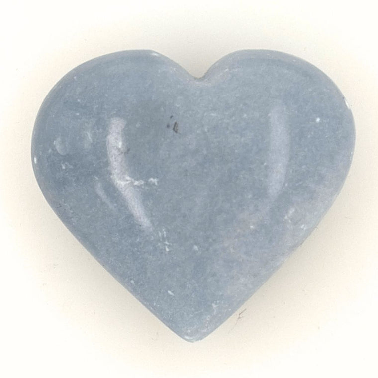 Natural polished Angelite crystal heart from Peru with soft blue colouring and a smooth finish, perfect for meditation, healing and gifting.