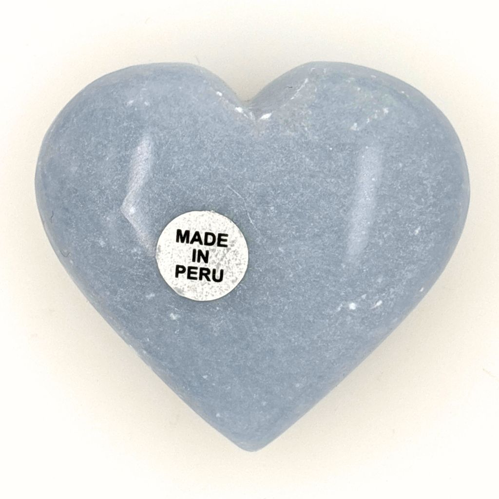 Natural polished Angelite crystal heart from Peru with soft blue colouring and a smooth finish, perfect for meditation, healing and gifting.