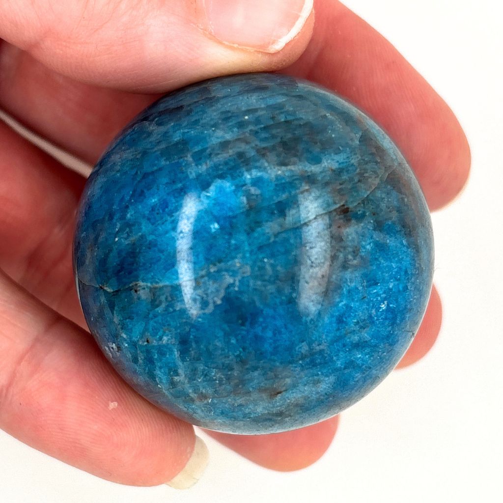 Natural Blue Apatite crystal sphere 144g with vibrant blue and teal colouring
