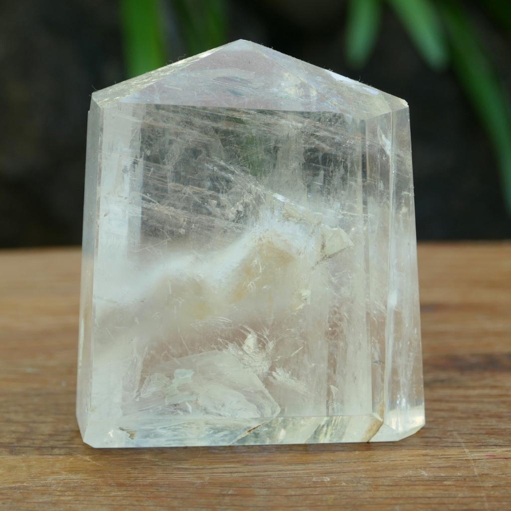 Unique Calcite crystal point with natural keyhole inclusion polished tower crystal