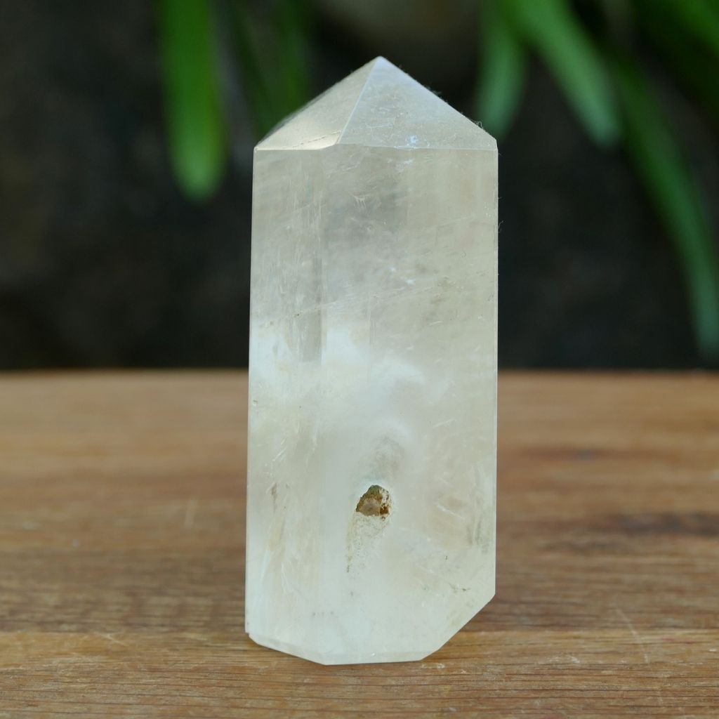 Unique Calcite crystal point with natural keyhole inclusion polished tower crystal