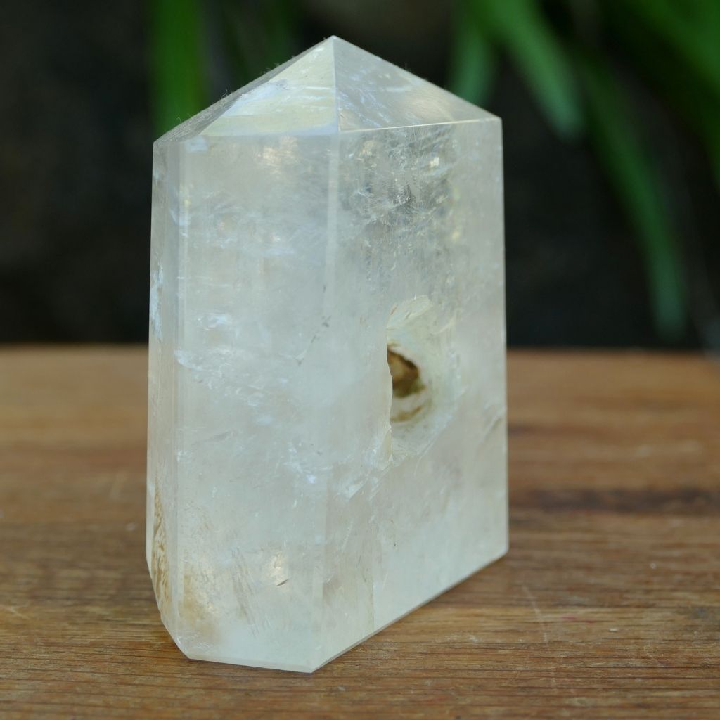 Unique Calcite crystal point with natural keyhole inclusion polished tower crystal
