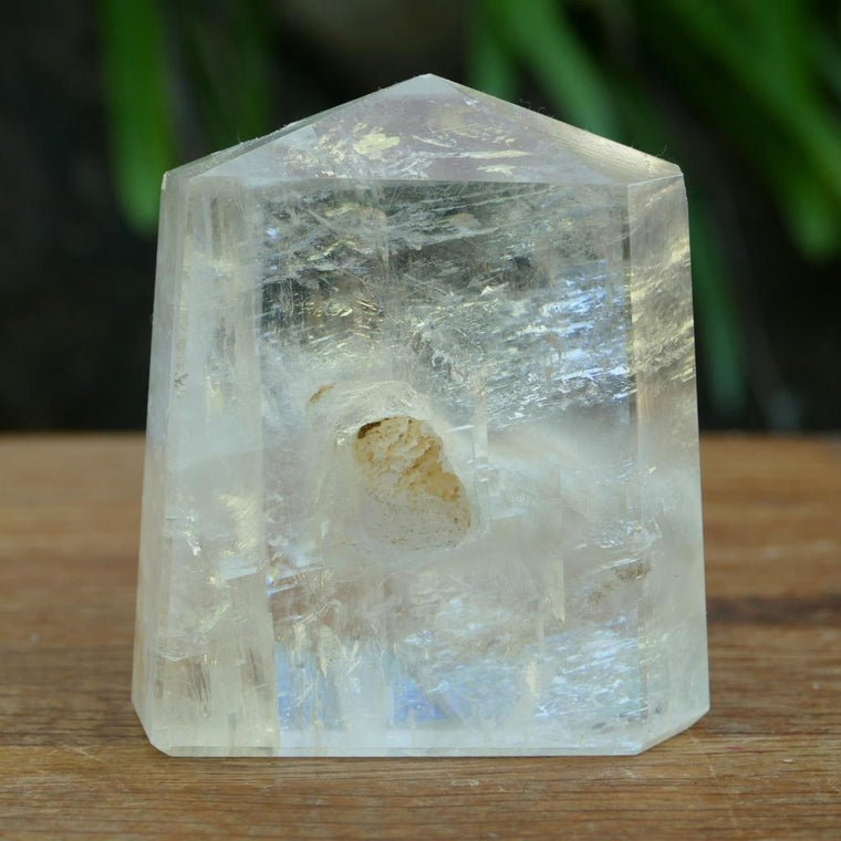 Unique Calcite crystal point with natural keyhole inclusion polished tower crystal