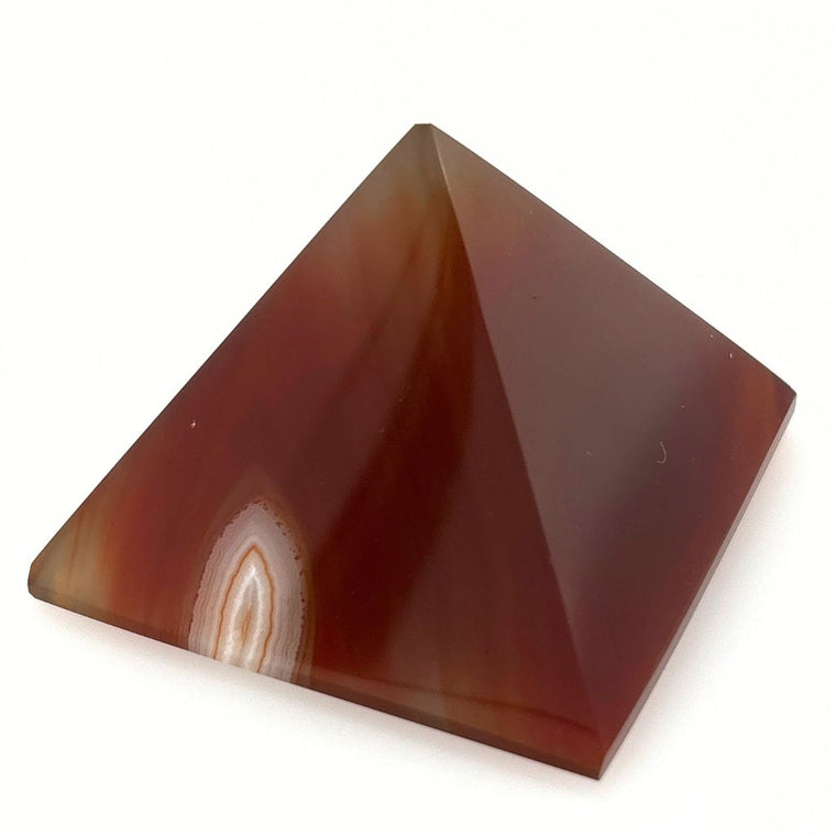 Polished Carnelian crystal pyramid with natural orange banding