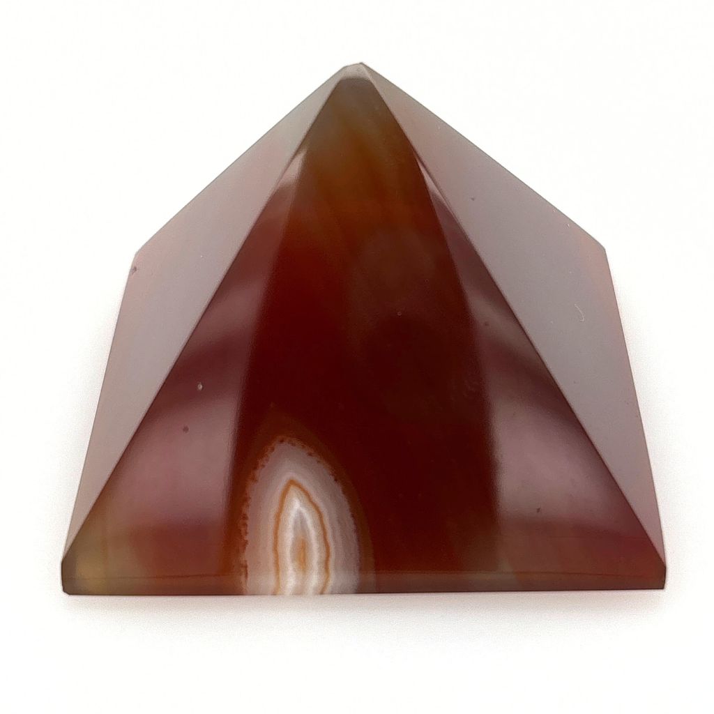 Polished Carnelian crystal pyramid with natural orange banding