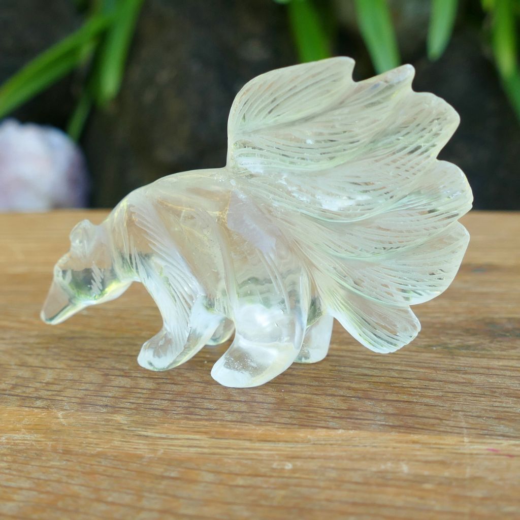 Hand carved Clear Quartz Anteater crystal carving with detailed tail and natural transparent quartz features.