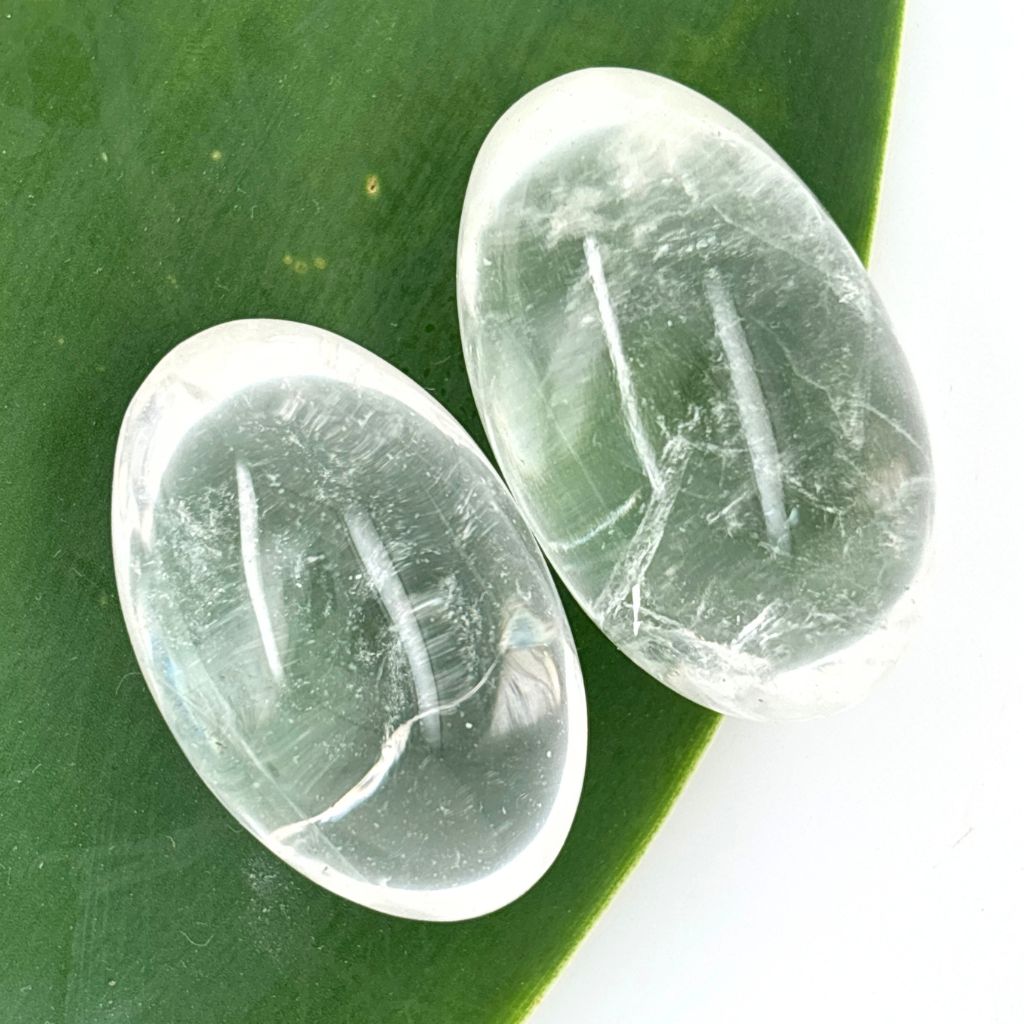 Polished Clear Quartz Lingam crystal for meditation, healing, clarity, manifestation, and energy amplification.