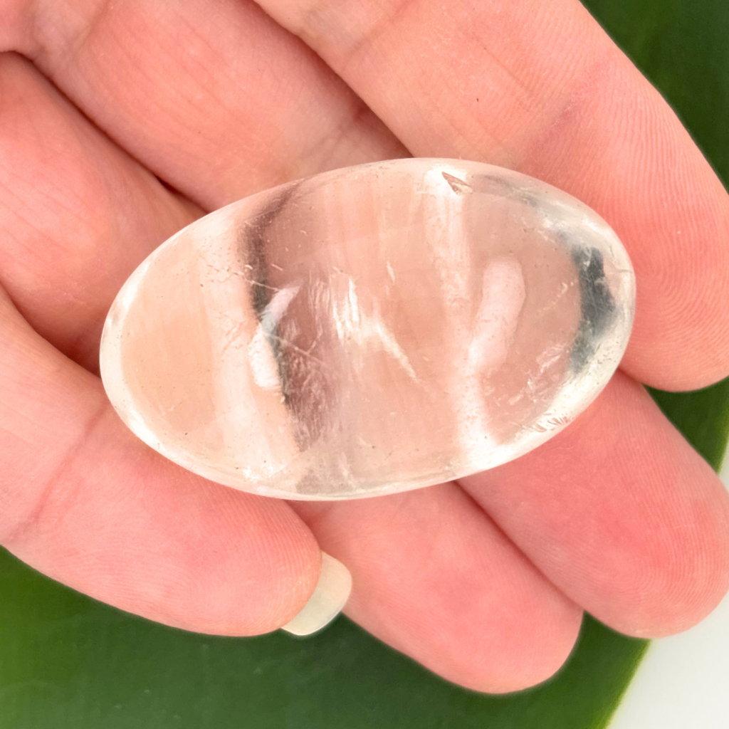 Polished Clear Quartz Lingam crystal for meditation, healing, clarity, manifestation, and energy amplification.
