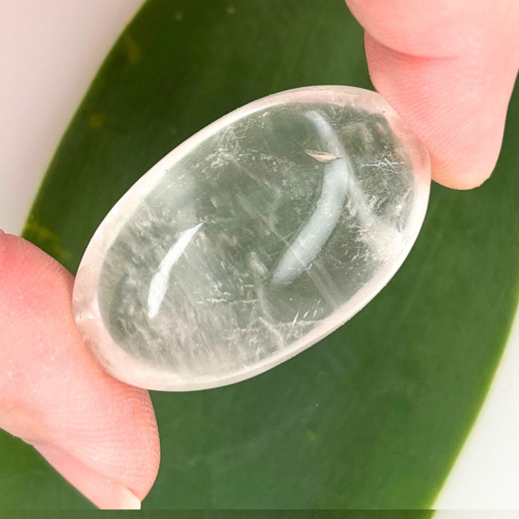 Polished Clear Quartz Lingam crystal for meditation, healing, clarity, manifestation, and energy amplification.