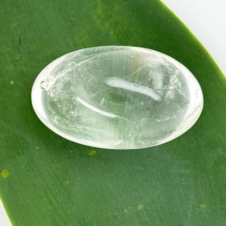 Polished Clear Quartz Lingam crystal for meditation, healing, clarity, manifestation, and energy amplification.
