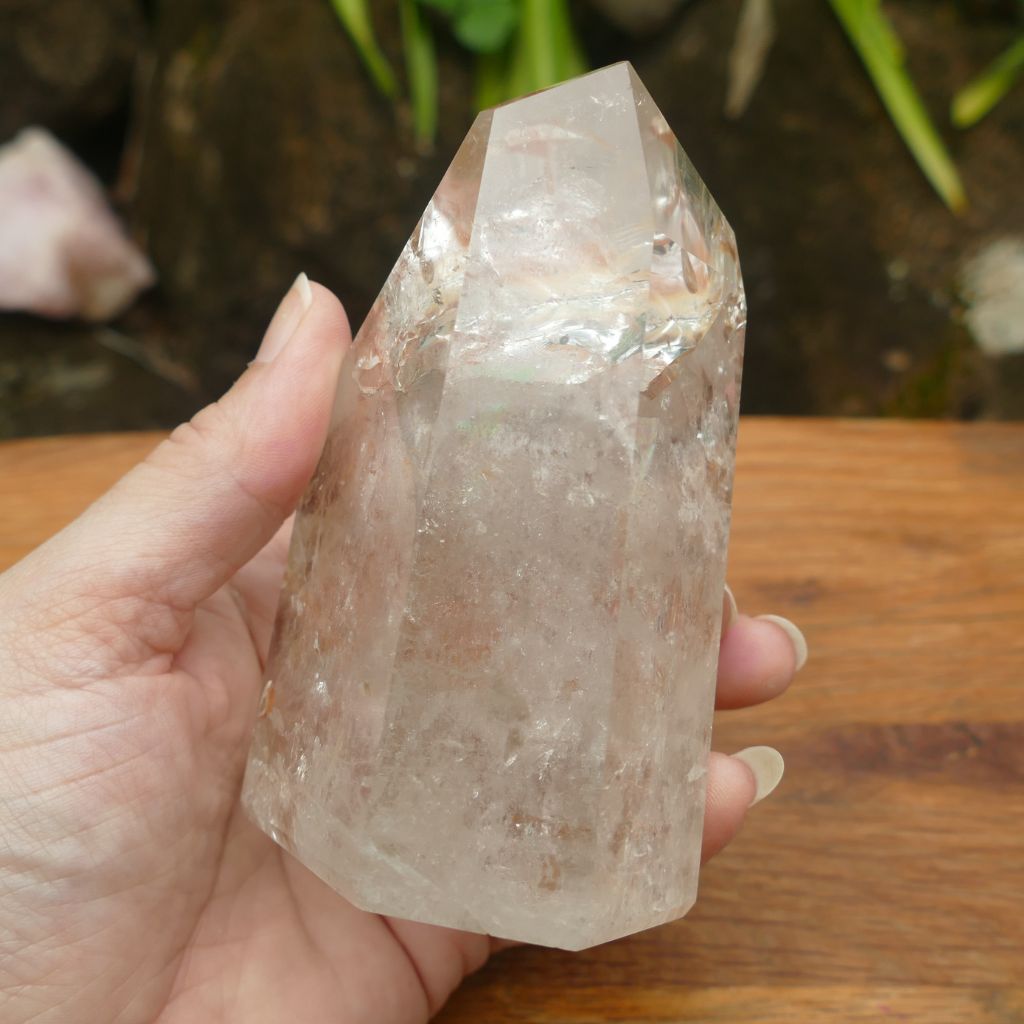 clear quartz point with beautiful inclusions