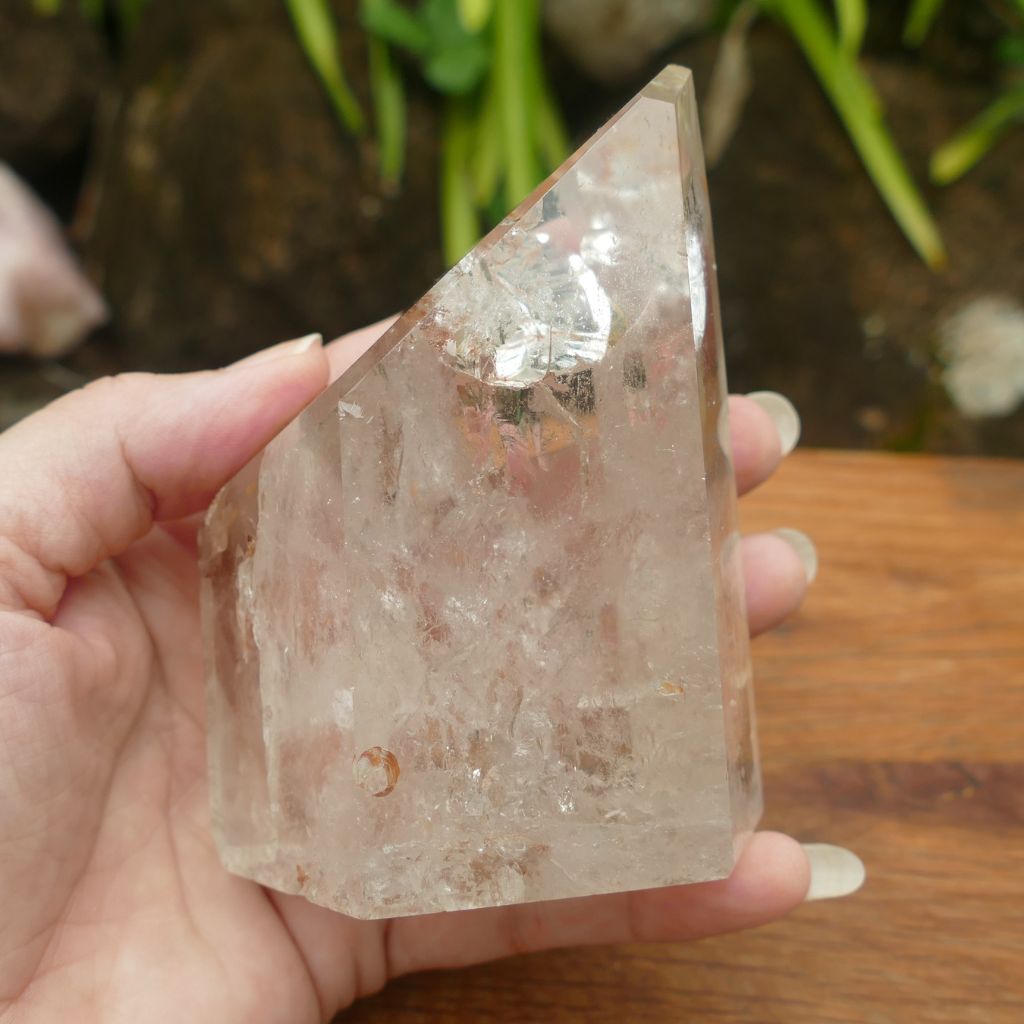 clear quartz point with beautiful inclusions