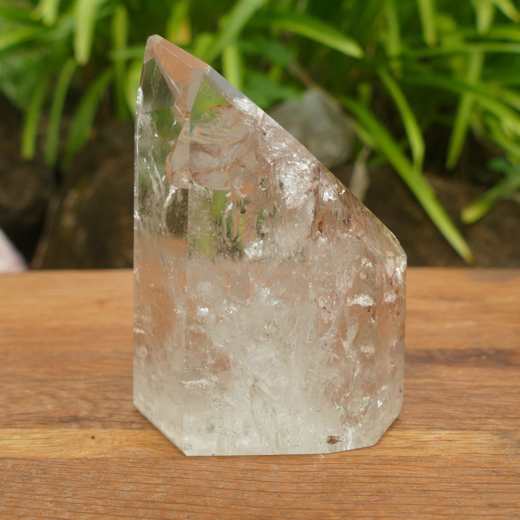 clear quartz point with beautiful inclusions