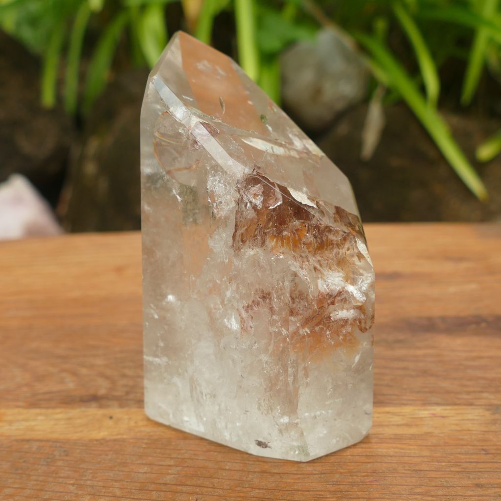 clear quartz point with beautiful inclusions