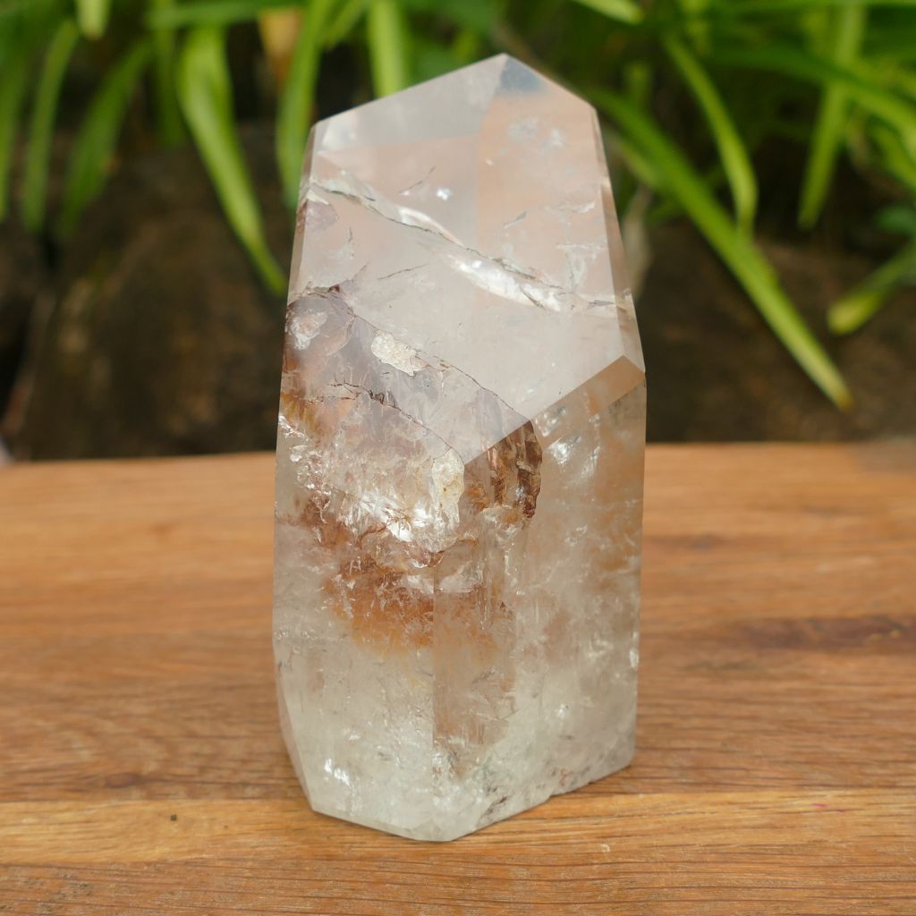 clear quartz point with beautiful inclusions