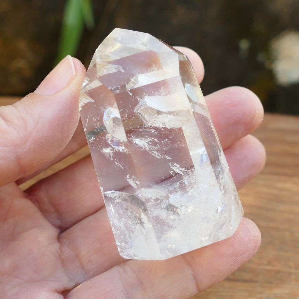 Natural Clear Quartz Point with keyhole and internal inclusions