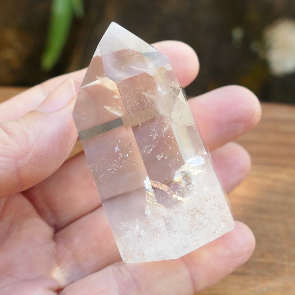Natural Clear Quartz Point with keyhole and internal inclusions