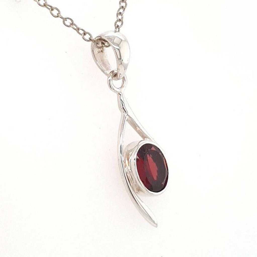 faceted garnet crystal pendant