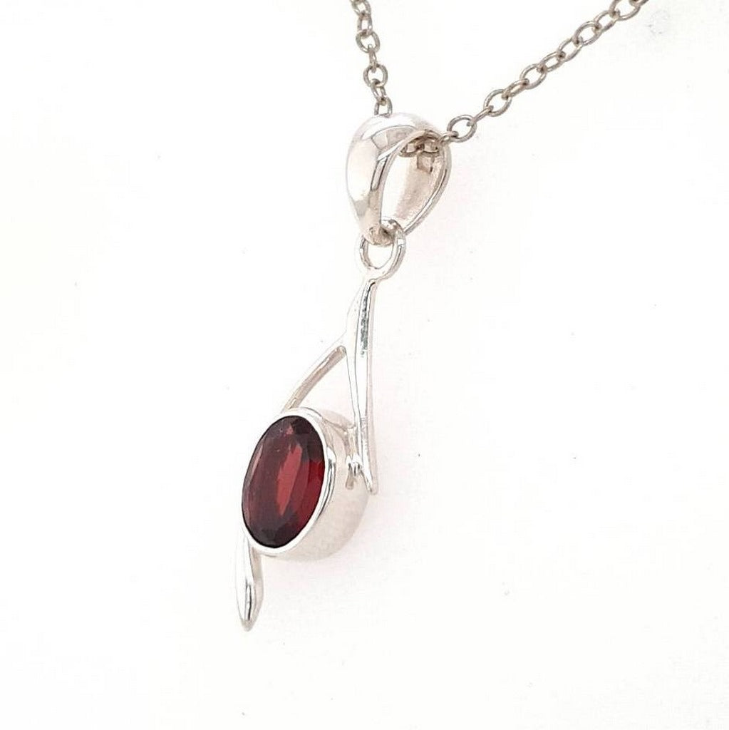 faceted garnet crystal pendant