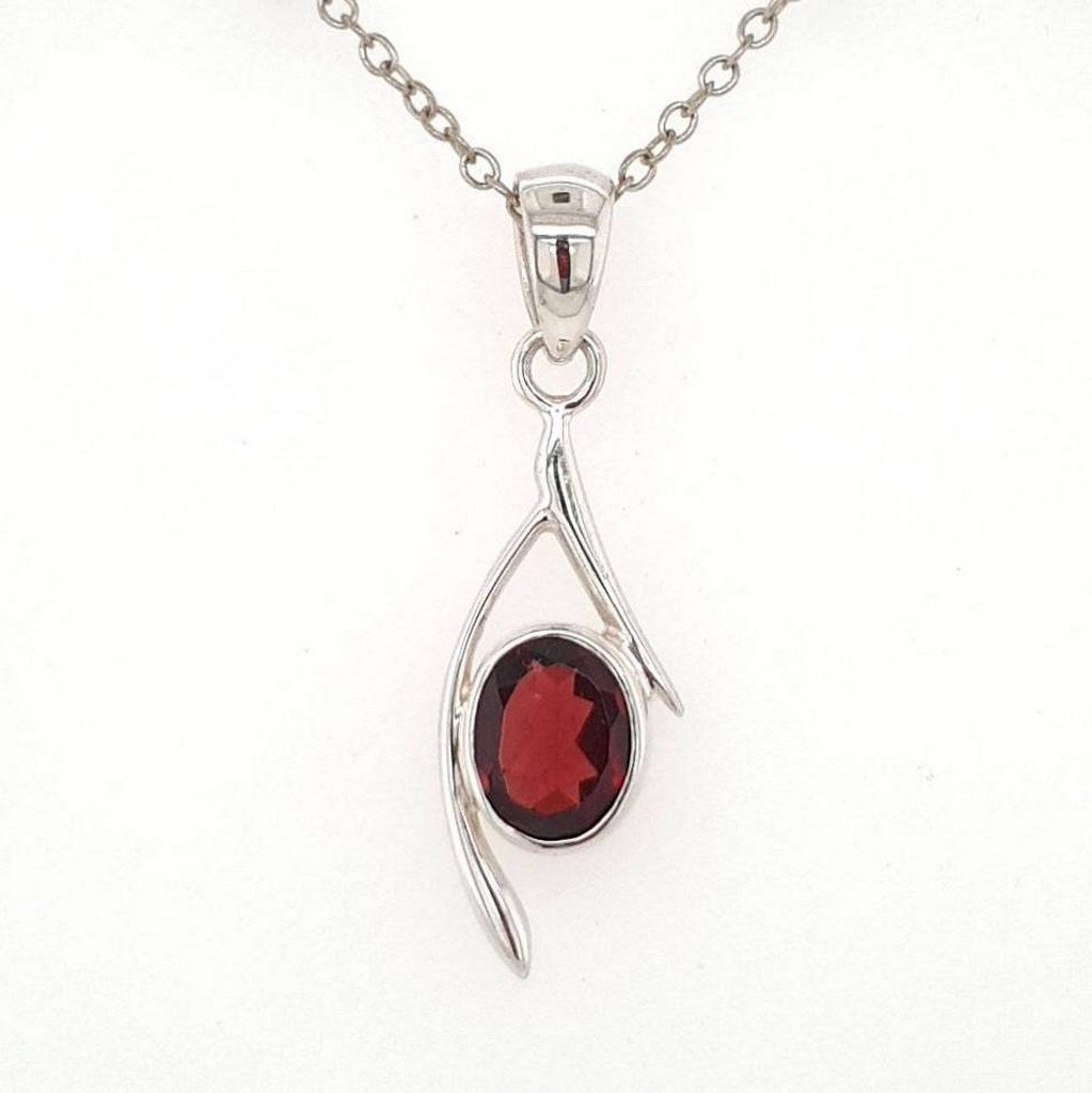 faceted garnet crystal pendant