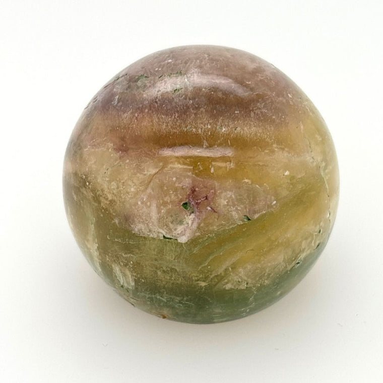 Polished Fluorite crystal sphere with green, gold and lavender natural banding and flat cut base for display