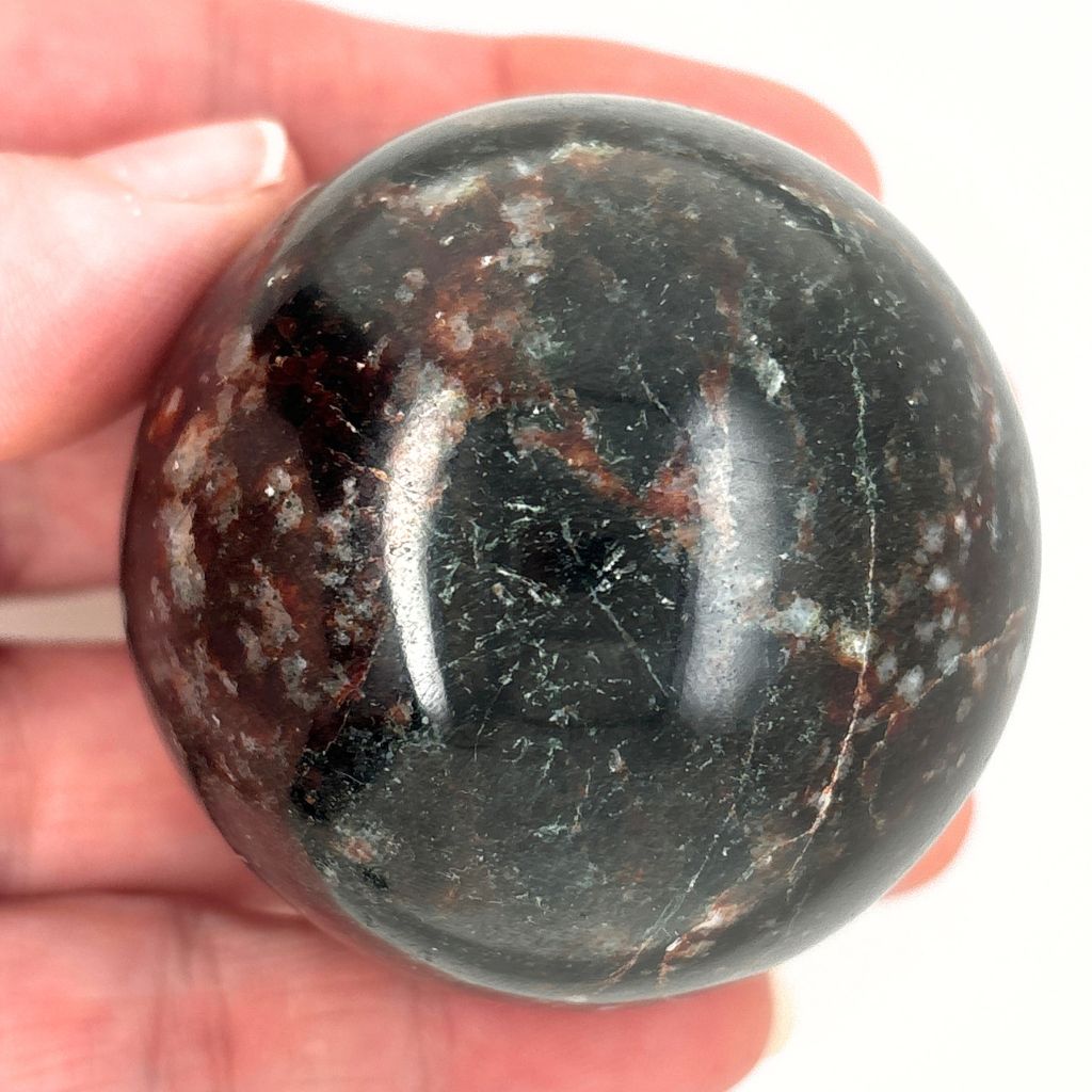 Natural Garnet crystal sphere 295g polished dark red stone