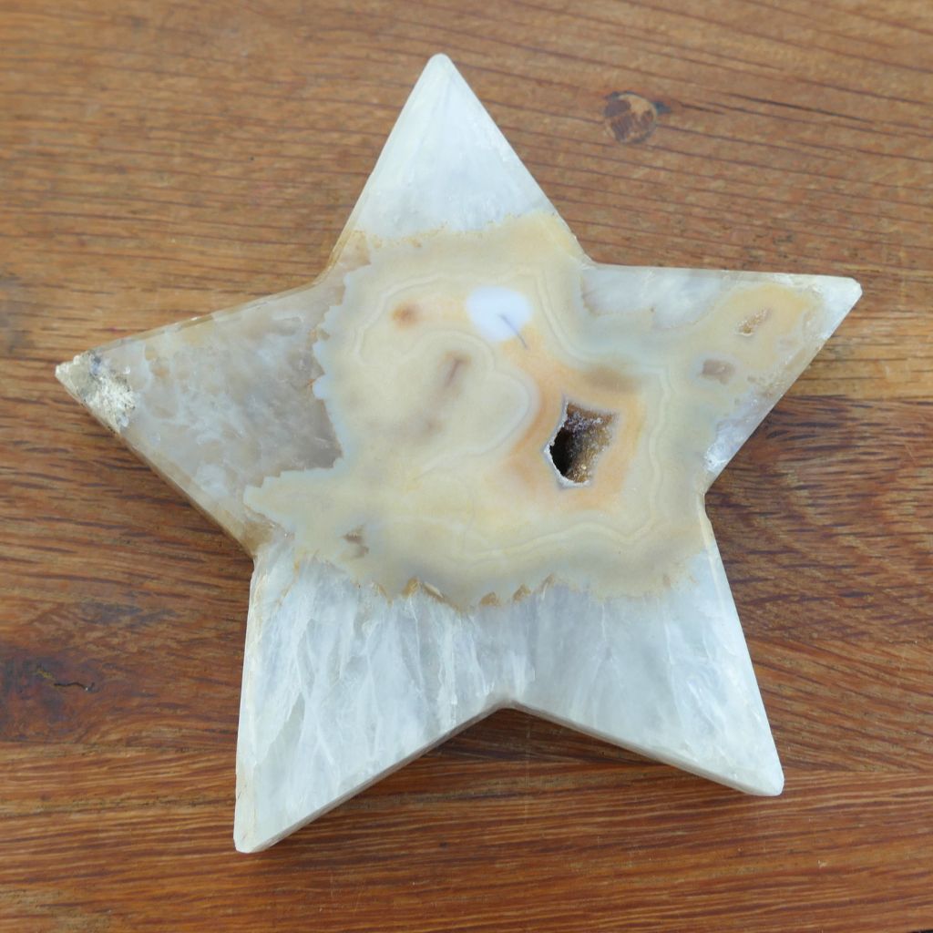 Natural agate crystal star with druzy crystal cavity and cream banding