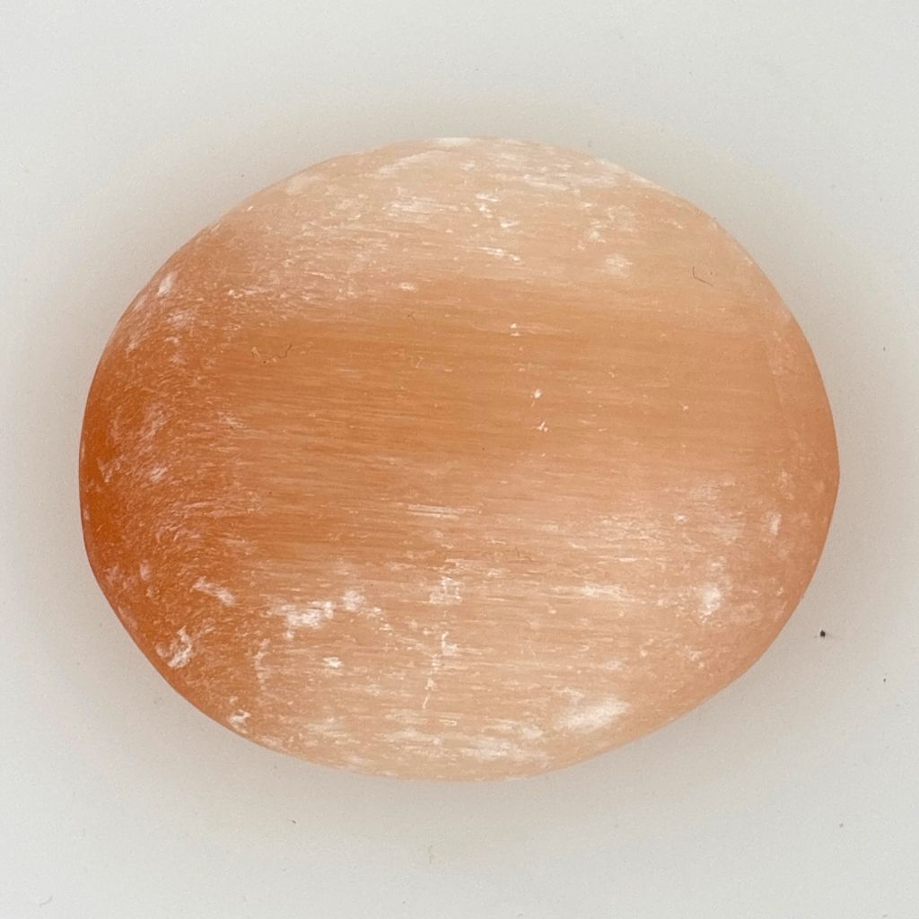 orange selenite palm stones