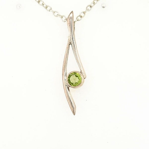 Peridot Crystal Pendant in a lovely Silver setting