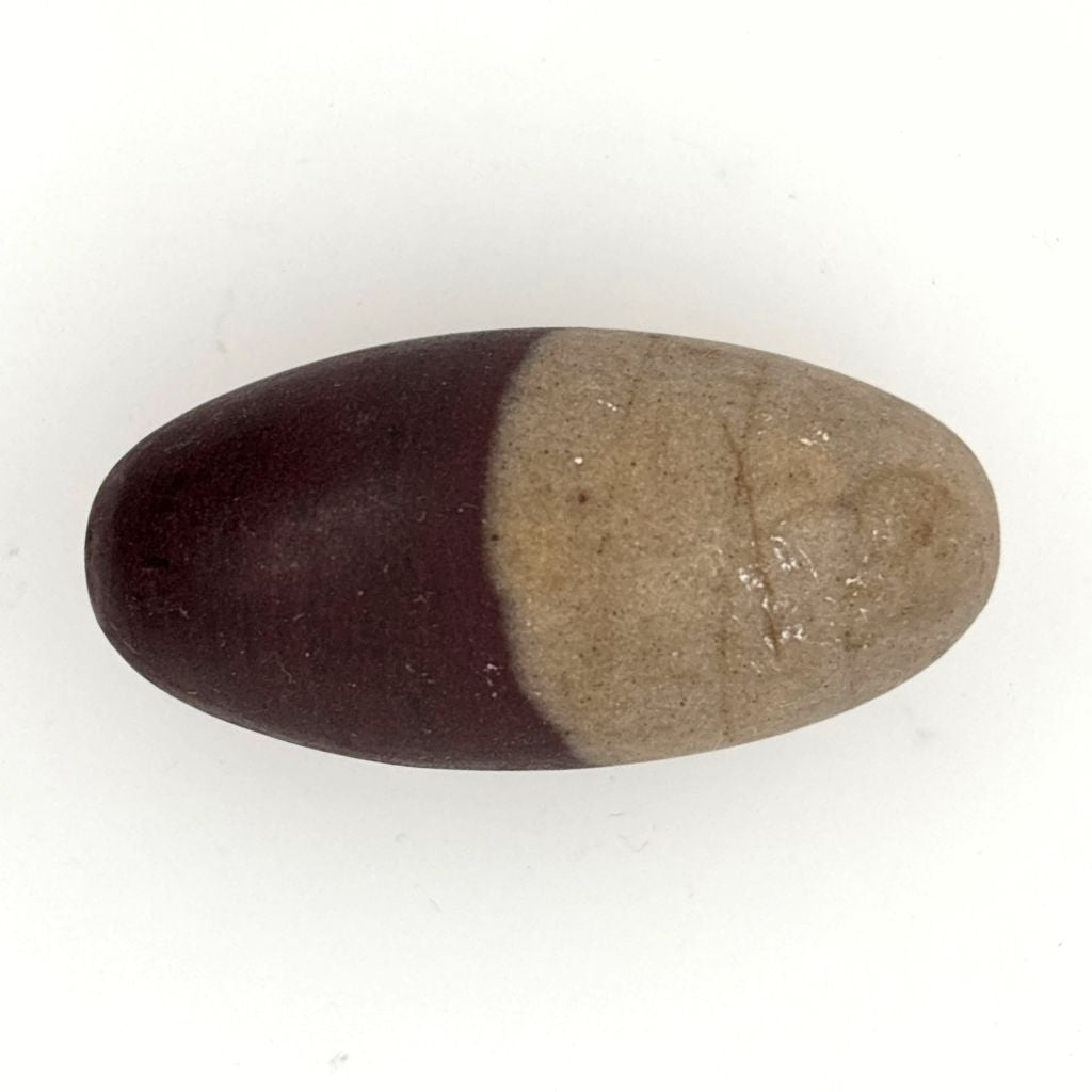 Natural Shiva Lingam Stone 40mm with brown and beige markings