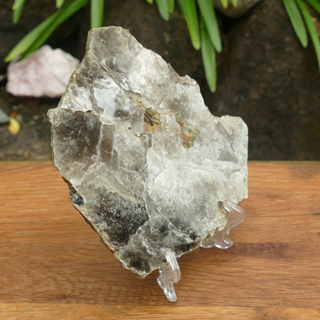 Natural Silver Muscovite Mica display specimen with layered sheet formation weighing 140g, ideal for crystal collectors and home décor.
