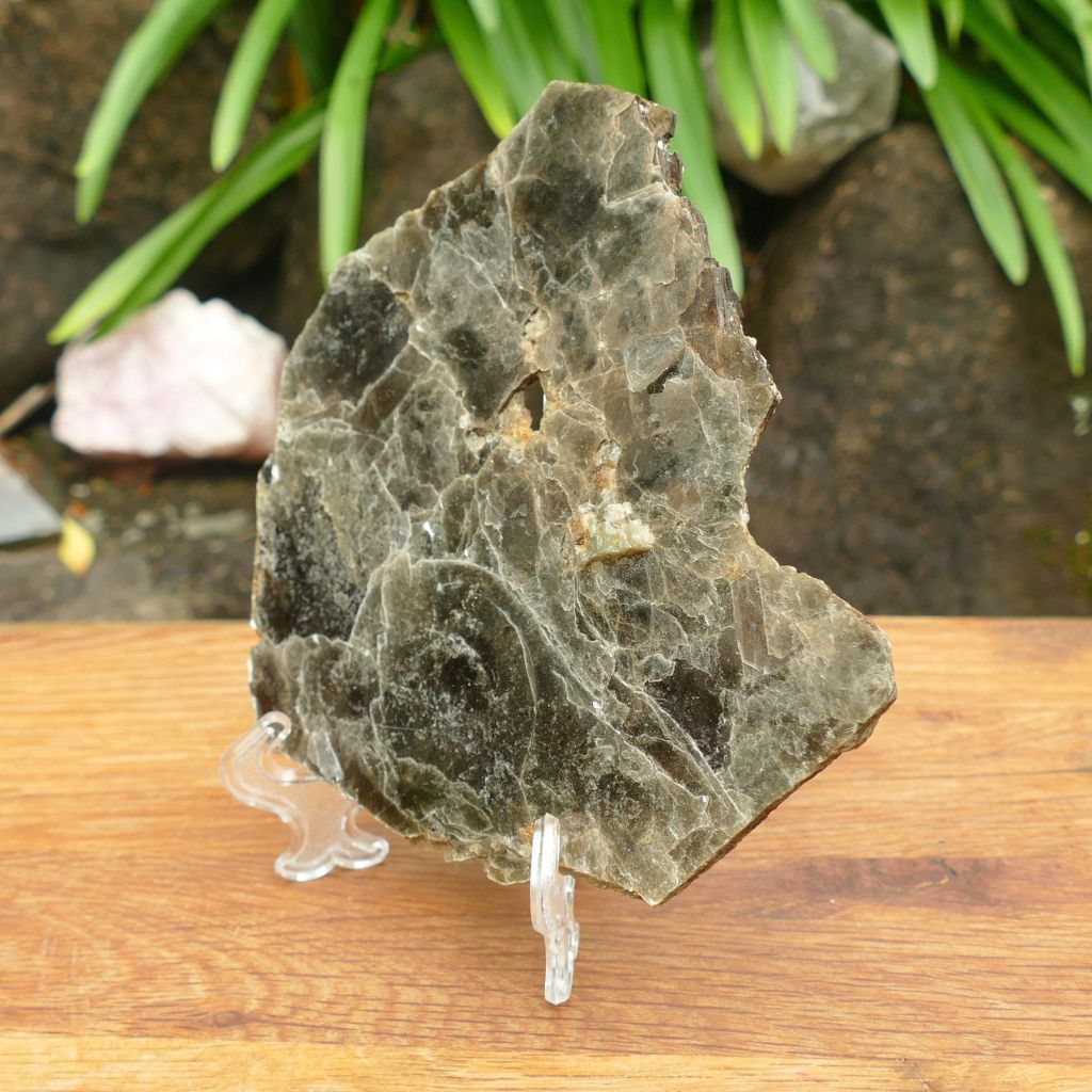 Natural Silver Muscovite Mica display specimen with layered sheet formation weighing 140g, ideal for crystal collectors and home décor.