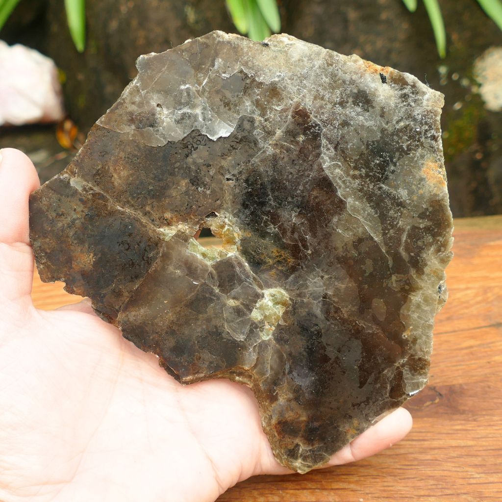 Natural Silver Muscovite Mica display specimen with layered sheet formation weighing 140g, ideal for crystal collectors and home décor.