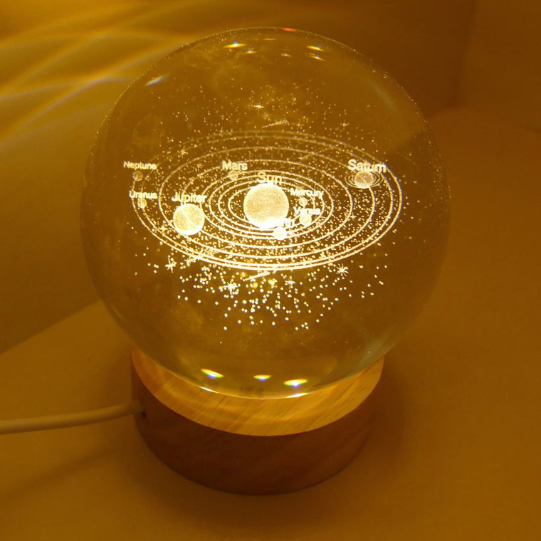 3D Solar System Crystal Ball LED Light with wooden base illuminated