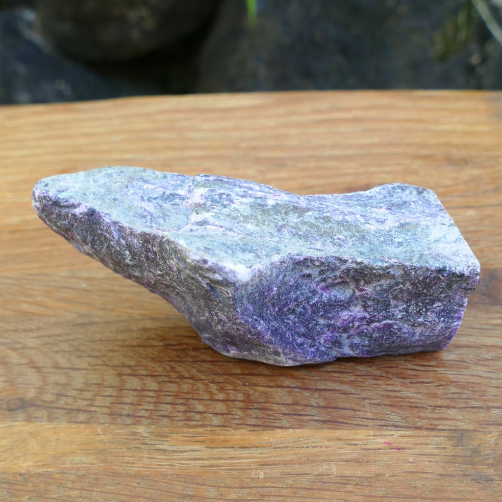 Natural Sugilite rough crystal specimen with purple Sugilite in matrix polished display stone