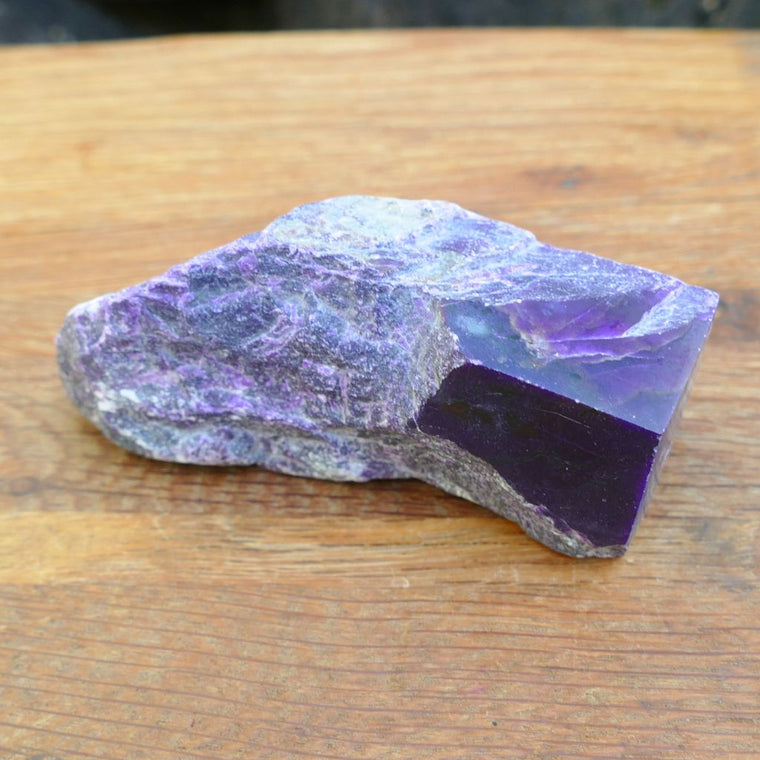 Natural Sugilite rough crystal specimen with purple Sugilite in matrix polished display stone