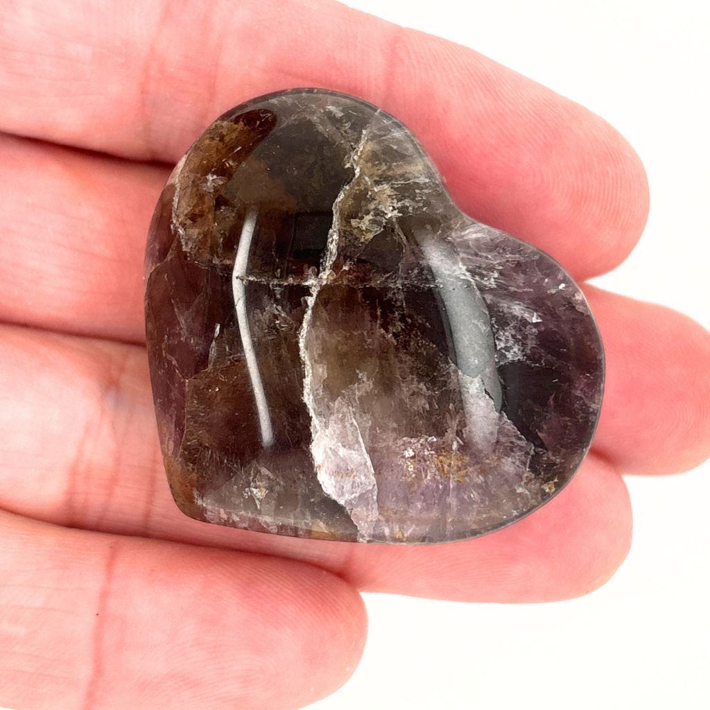 Natural Super Seven Crystal Heart with smoky grey and amethyst tones, polished healing crystal for intuition, spiritual growth and emotional balance.