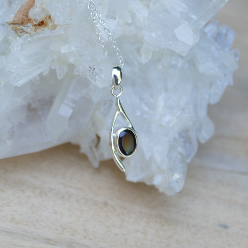 faceted garnet crystal pendant